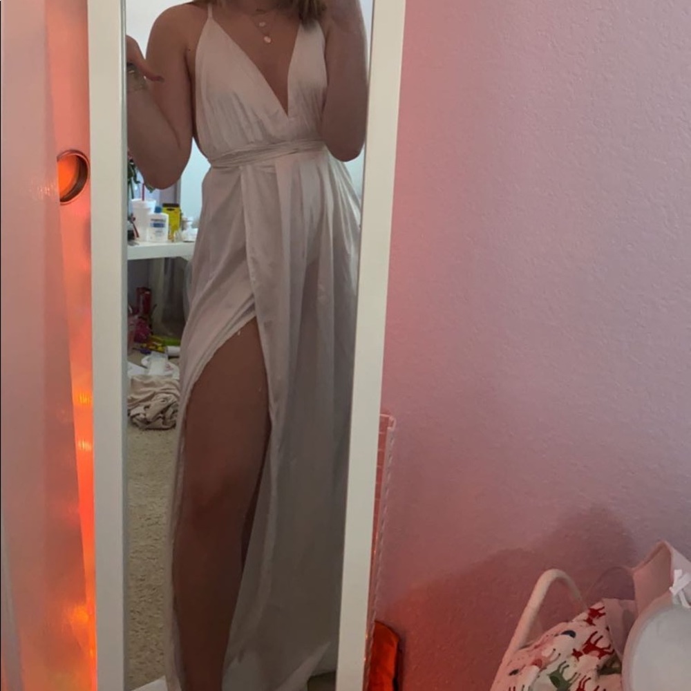 white open back prom dress with slit on the side that ties up